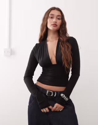 Weekday deep halter neck long sleeve top in black exclusive to ASOS