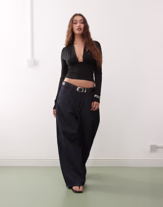 Weekday deep halter neck long sleeve top in black exclusive to ASOS